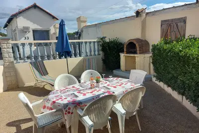 Image de Appartement rez-de-chaussée de type villa avec sa propre terrasse privée spacieuse pour 4 personnes