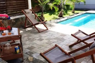 Image de Villa 4 Etoiles De Standing Les Pieds Dans L'Eau Piscine Et Jardin Prives