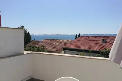 Image de Appartement de deux chambres avec la terrasse et la vue sur le mer Zdrelac, Pasman (A-8046-b)