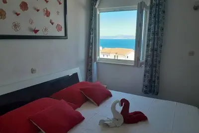 Image de Appartement de deux chambres avec la terrasse et la vue sur le mer Postira, Brac (A-2911-c)