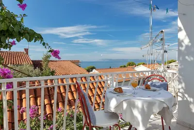 Image de Appartement de trois chambres avec la terrasse et la vue sur le mer Podgora, Makarska (A-6671-d)