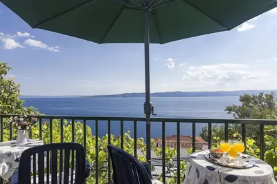 Image de Appartement d'une chambre avec la terrasse et la vue sur le mer Brela, Makarska (A-11687-b)