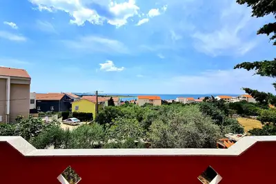 Image de Appartement de deux chambres avec la terrasse et la vue sur le mer Novalja, Pag (A-13200-b)