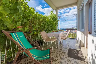 Image de Appartement de deux chambres avec la terrasse et la vue sur le mer Selce, Crikvenica (A-2381-c)