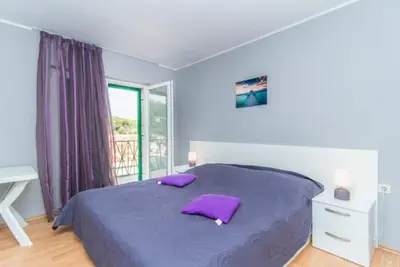 Appartement de deux chambres avec la terrasse et la vue sur le mer Povlja, Brac (A-12362-a)
