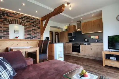 Image de Ferienwohnung Almrausch (ca. 71 Qm) mit 2  Schlafzimmer, Wohnküche mit großem Sofa, Dusche/Wc und Terrasse