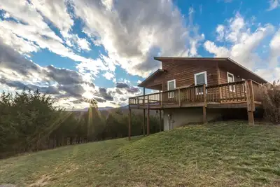 Image de \"Sundance\" Superbe cabine au bord de la rivière sur 54 acres avec bain à remous et vue spectaculaire