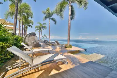 Magnifique Condo de luxe face à la mer (bar sur la plage et sur le toit et piscines à débordement)