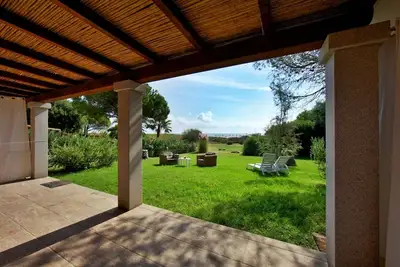 Image de Maison avec jardin sur le sable