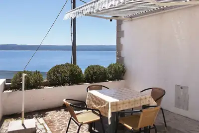 Image de Appartement de deux chambres avec la terrasse et la vue sur le mer Pisak, Omis (A-1011-a)