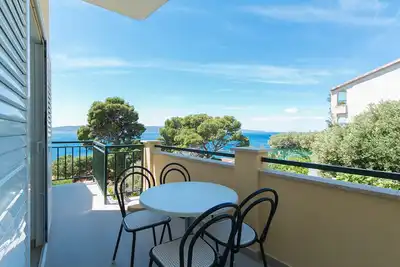 Appartement de deux chambres avec le balcon et la vue sur le mer Brela, Makarska (A-2717-c)