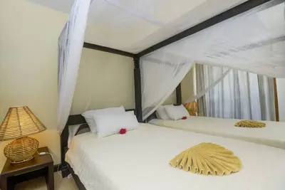 Image de Blue Bay Cove - Appartement côté plage