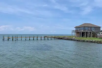 Image de Hooligan Sunset: pont au bord de l’eau, couchers de soleil, ponton privé.