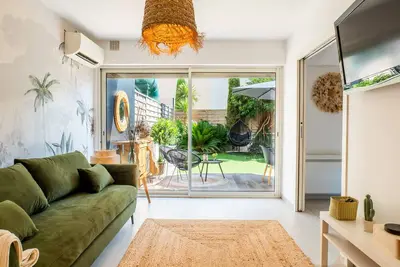 Image de 2p cozy avec jardin en plein coeur du Palm Beach