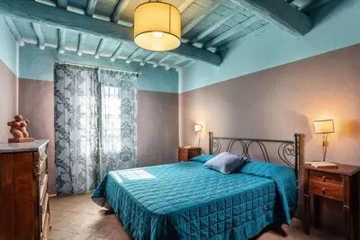 Image de Appartement avec piscine, climatisation, Wifi, Tv, patio, vue panoramique, près de Greve In Chianti