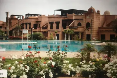 Image de Luxueux Appartement marrakech avec jardin privé accès piscine à Atlas Golf Resor