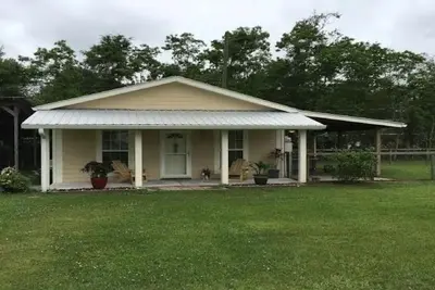 Image de Taylor Ranch Cottage. . . . Une retraite au milieu de tout sur la cĂ´te! !
