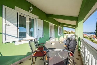 Appartement de deux chambres avec la terrasse et la vue sur le mer Kampor, Rab (A-14841-b)