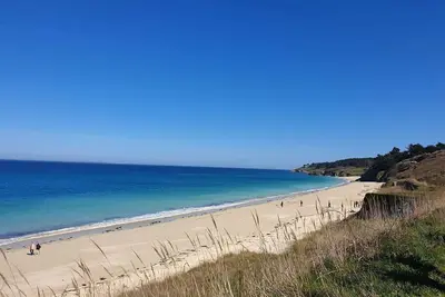 Image de Maison rénovée à 800m de la Plage des Grands Sables - Jardin privé, Wifi, Confort et Charme