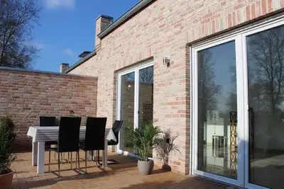 Image de Grande maison de vacances de 100 m² au centre de Rhauderfehn!