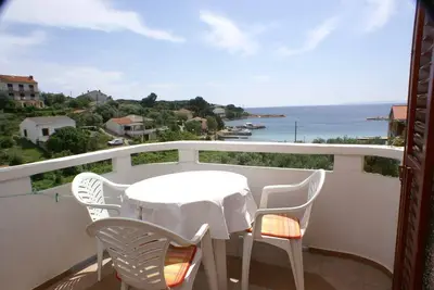 Image de Appartement d'une chambre avec la terrasse et la vue sur le mer Jakisnica, Pag (A-4160-a)