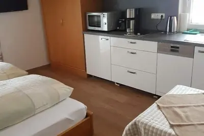 Image de Appartement pour 1-2 personnes avec balcon et kitchenette