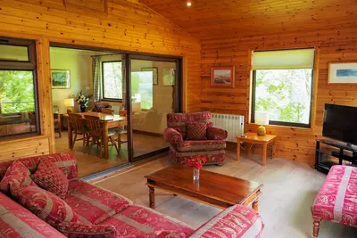 Image de Buzzard - un magnifique chalet de vacances 4 étoiles entouré d'un véritable paysage des Highlands pouvant dormir