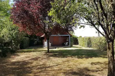 Image de Chalet climatisé + wifi indépendant proche des lacs et de Nigloland