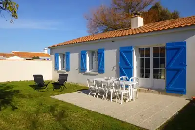Image de Maison lumineuse avec jardin clos, à 400m de la plage, pour 8 personnes, secteur calme