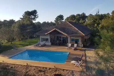Image de A 1km des plages, magnifique villa avec piscine chauffée, proche des Golfs
