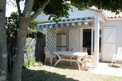 Image de Maison proche plage et commerces, 2 chambres, jardin, parking privé