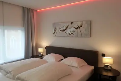 Image de Appartement duplex de luxe de la ville avec balcon et une cuisine entièrement équipée