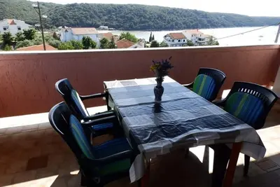 Image de Appartement de deux chambres avec la terrasse et la vue sur le mer Kampor, Rab (A-15144-a)