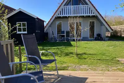 Image de Maison confortable 'heide' 6p au bord d'un canal près du lac Lauwersmeer