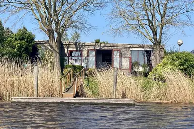 Image de 2 pers - maison König au bord du lac Lauwersmeer avec son propre quai de pêche Sauna