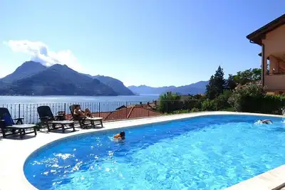 Image de Bel appartement neuf avec piscine Superbe vue panoramique sur le lac
