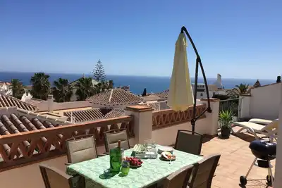 Image de Appartement Nerja près de la plage de Burriana, piscine, grande terrasse, vue panoramique sur la mer