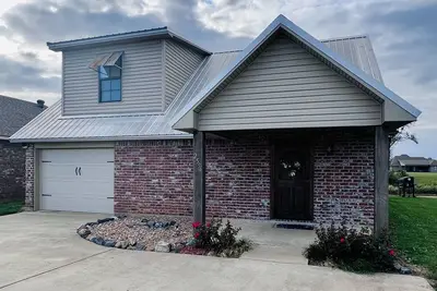 Image de Maison au bord de l'eau sur la rivière Cane