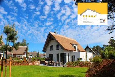 Image de 5 ***** luxe chaume directement dans la forêt dunaire sur la plage, une baignoire spa, un sauna, Ssc