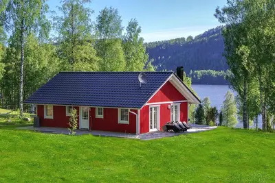 Image de maison suédoise exclusive dans un emplacement idéal sur le lac Rottnansee avec son propre rivage