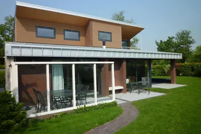 Image de Villa א Kamperland avec jardin
