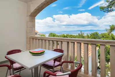 Image de Appartement de deux chambres avec le balcon et la vue sur le mer Postira, Brac (A-15242-b)