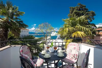 Image de Appartement de vacances avec climatisation et vue sur la mer