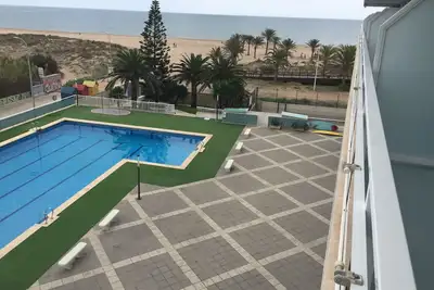 Image de Première ligne de mer, appartement avec une capacité de six personnes