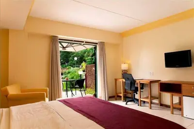 Image de Chambres standard avec vue sur le jardin