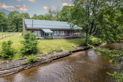 Image de Rapid River Lodge: Nouveau spa de luxe! Capacité d'accueil de 18 ans et plus, animaux domestiques, accès handicapés.