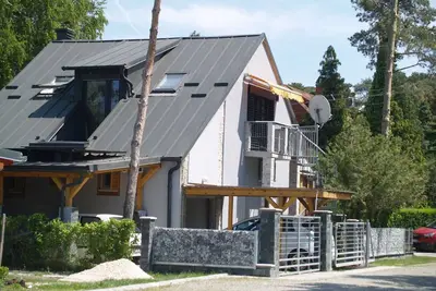 Image de Maison de vacances à seulement 20 mètres de la plage avec chauffage
