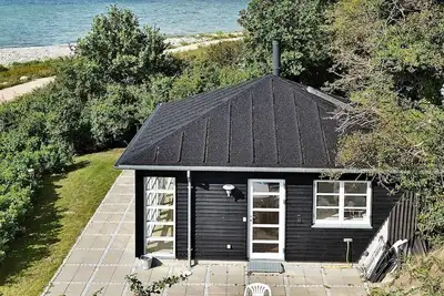 Image de Maison de vacances pour 4 a Martofte-By Traum