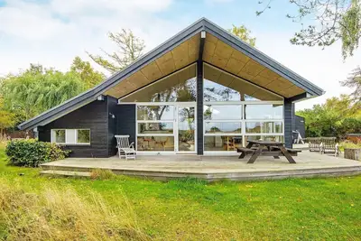 Image de Maison de vacances pour 6 a Glesborg-By Traum