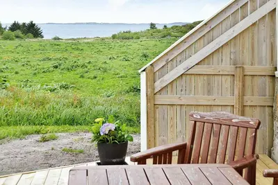 Image de Maison de vacances pour 11 a Fjørtoft-By Traum